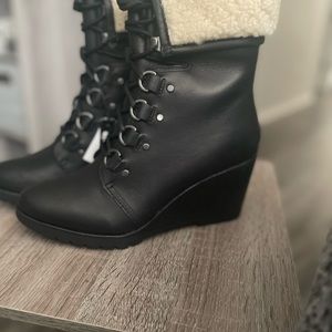 Sorel After Hours Lace Shearling wedge boots.